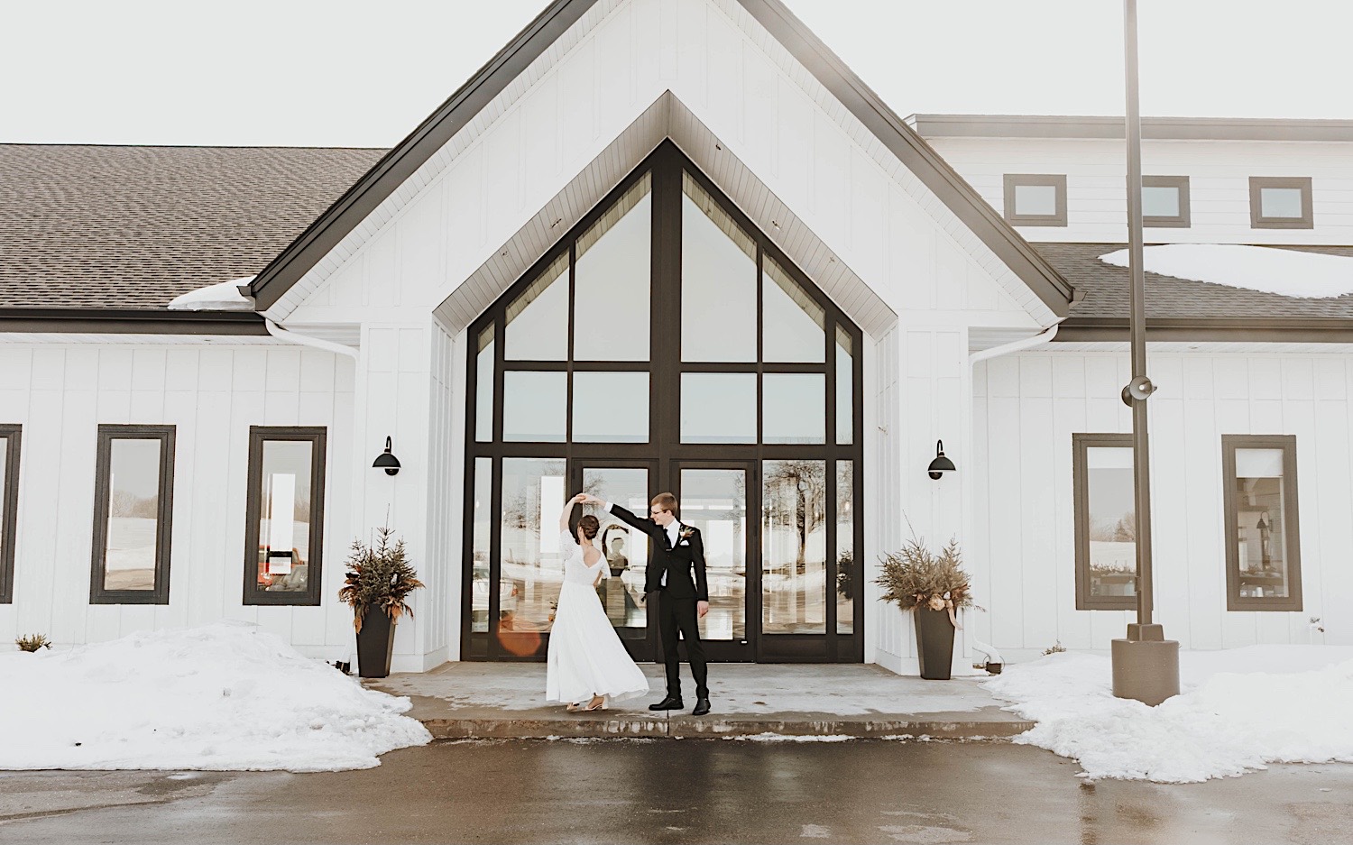 A bride and groom dance with one another while outside the Minnesota wedding venue, Woodhaven Weddings + Events A bride and groom dance with one another while outside the Minnesota wedding venue, Woodhaven Weddings + Events