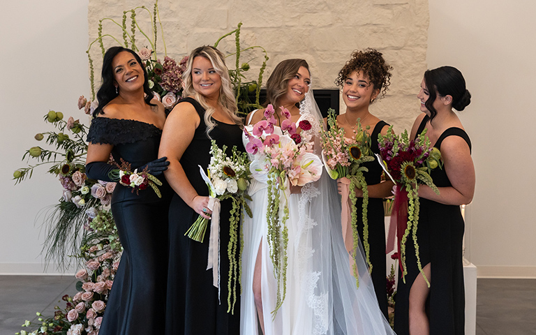 Bride with Bridesmaids on Wedding Day
